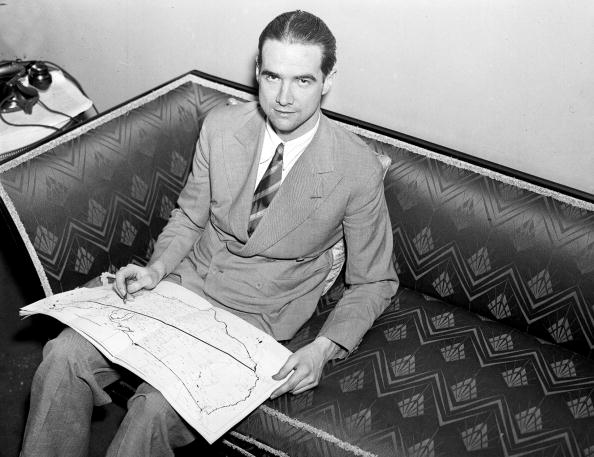 UNITED STATES - JANUARY 14: Howard Hughes relaxes after he spanned the U.S. in 9 1/2 hours, whizzing 260 miles-an-hour from Burbank, Calif., to Newark, N.J,, and setting a new cross-country record. (Photo by NY Daily News Archive via Getty Images)
